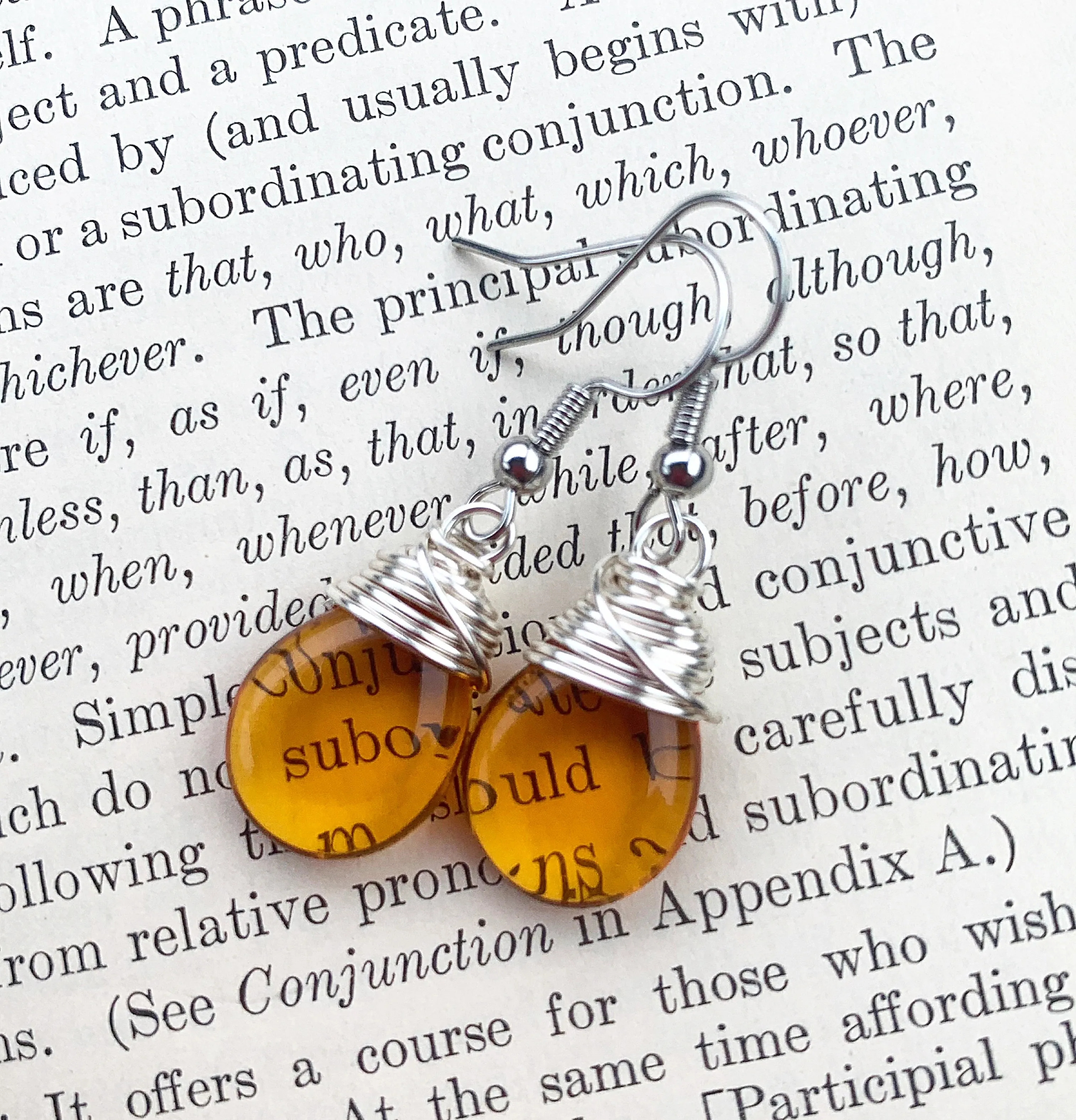 Amber teardrop Czech glass and silver wire wrapped, sterling silver earrings.