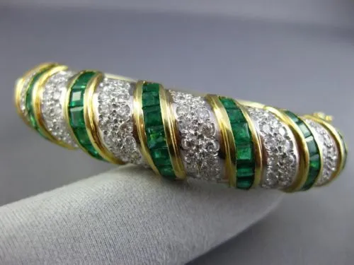 ESTATE WIDE 12.52CT DIAMOND & AAA EMERALD 18KT TWO TONE GOLD MULTI ROW BANGLE