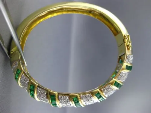 ESTATE WIDE 12.52CT DIAMOND & AAA EMERALD 18KT TWO TONE GOLD MULTI ROW BANGLE