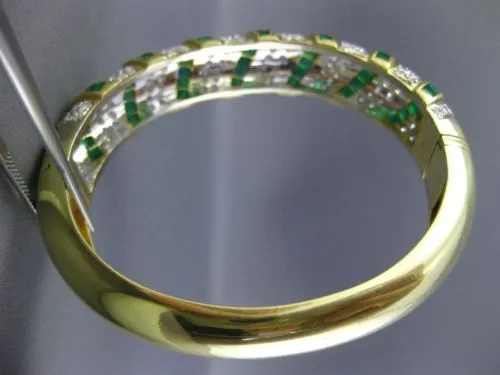 ESTATE WIDE 12.52CT DIAMOND & AAA EMERALD 18KT TWO TONE GOLD MULTI ROW BANGLE