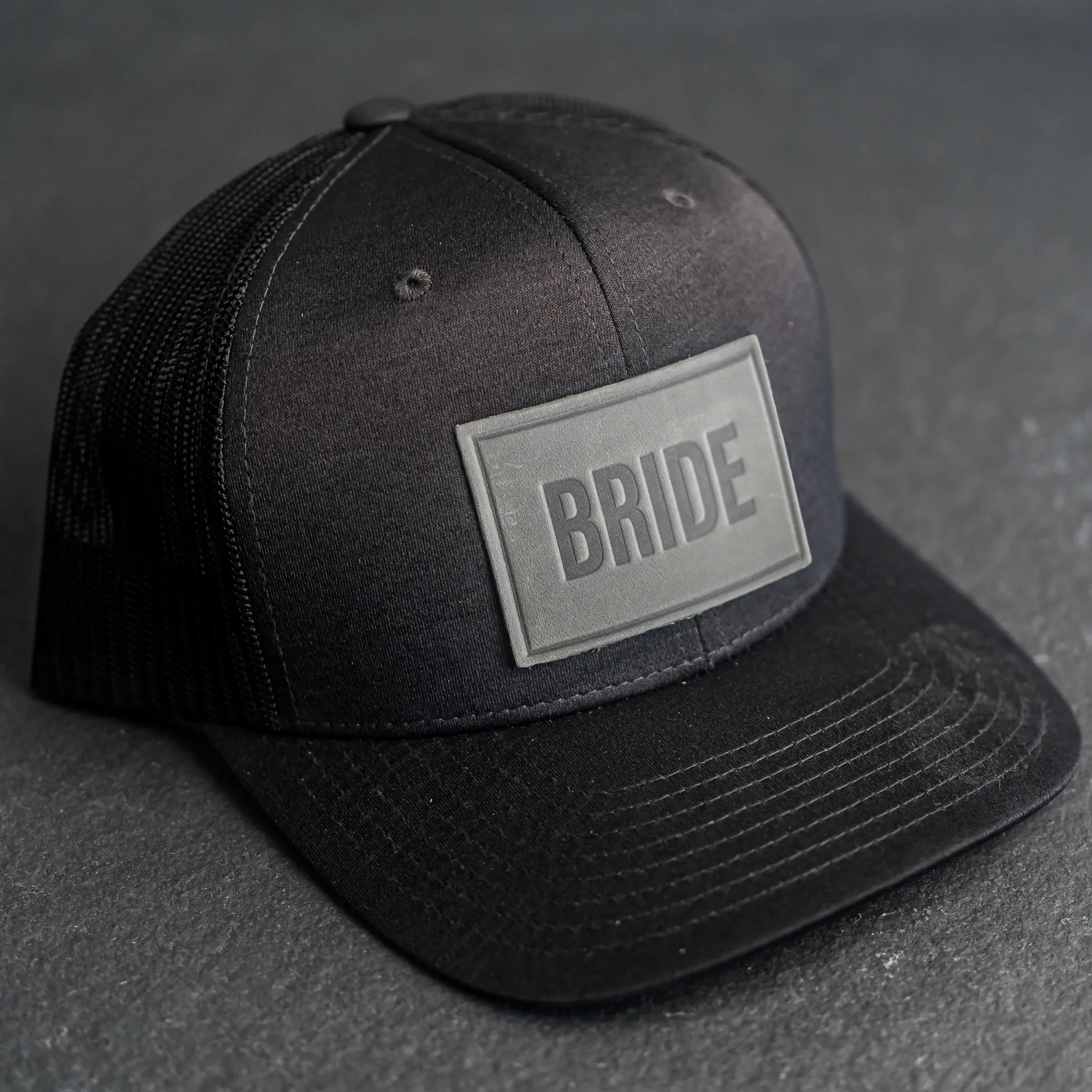 Leather Patch Performance Style Trucker Hat - Bride and Groom Stamp (block)