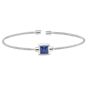 Rhodium Finish Sterling Silver Cable Cuff Bracelet with Princess Cut Simulated Blue Topaz Birth Gem